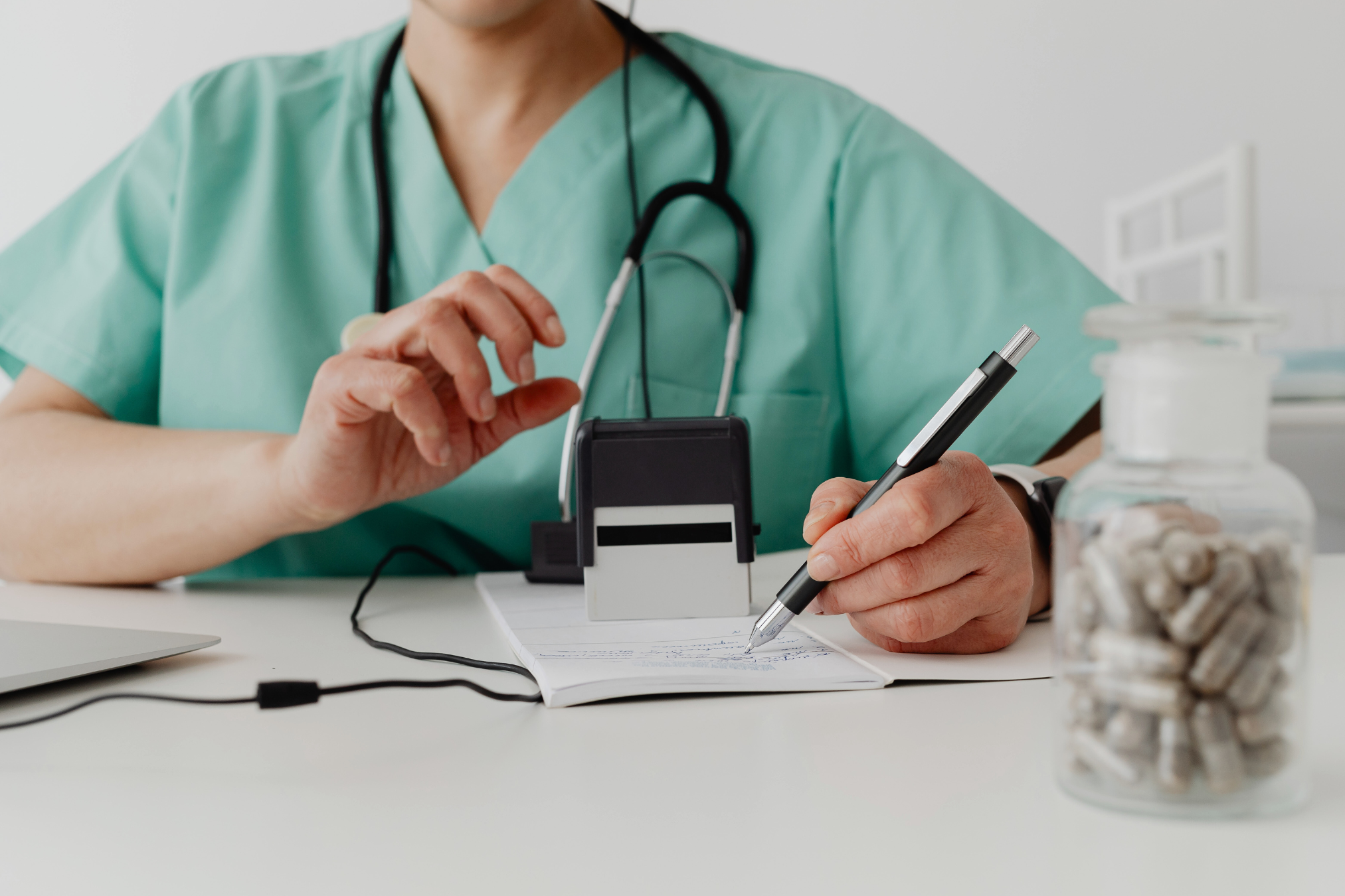 Pharmacist preparing pharmaceutical supplies and medical equipment